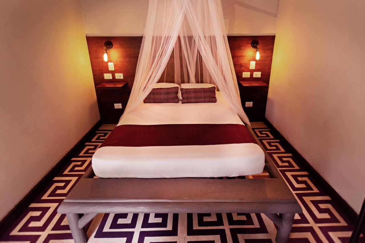 Jungle Lodge Tikal Hostal Bagian luar foto