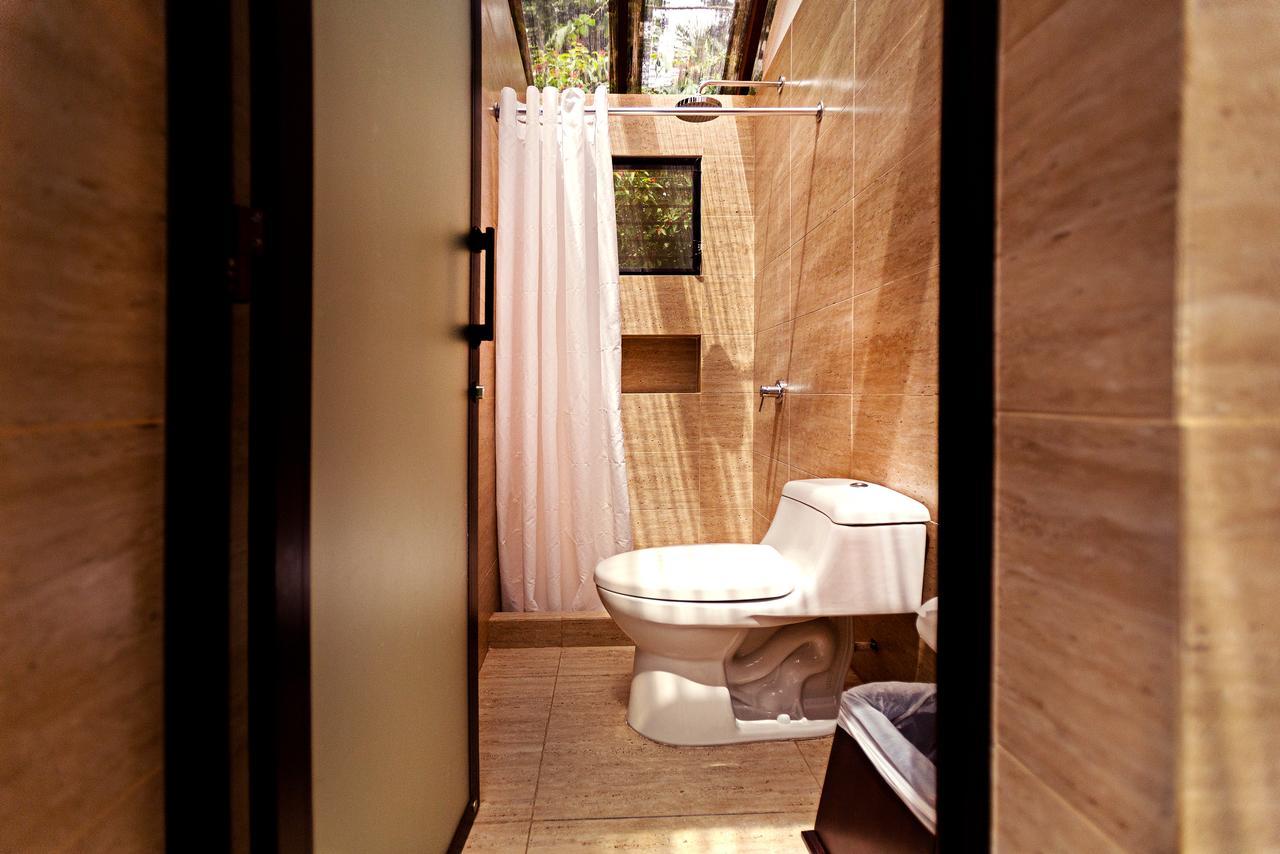 Jungle Lodge Tikal Hostal Bagian luar foto